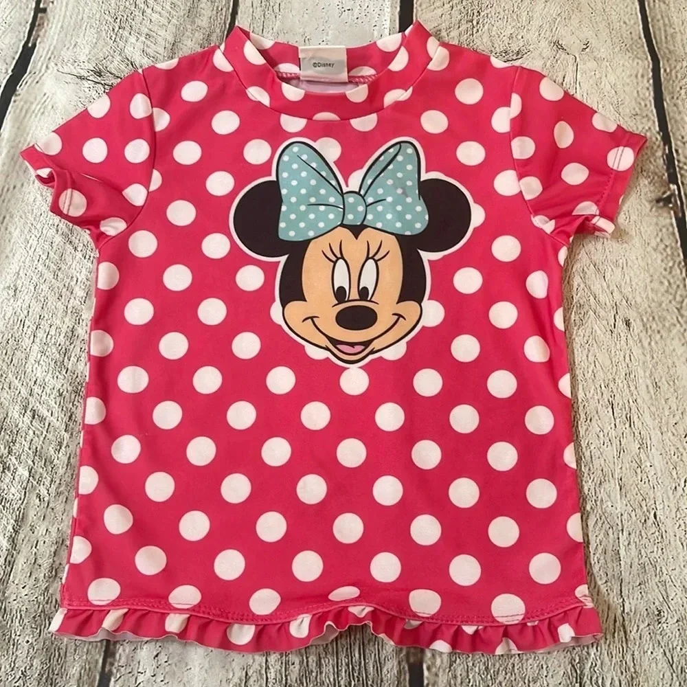 Girl’s Disney’s Minnie Mouse pink polka dot rash guard 3T